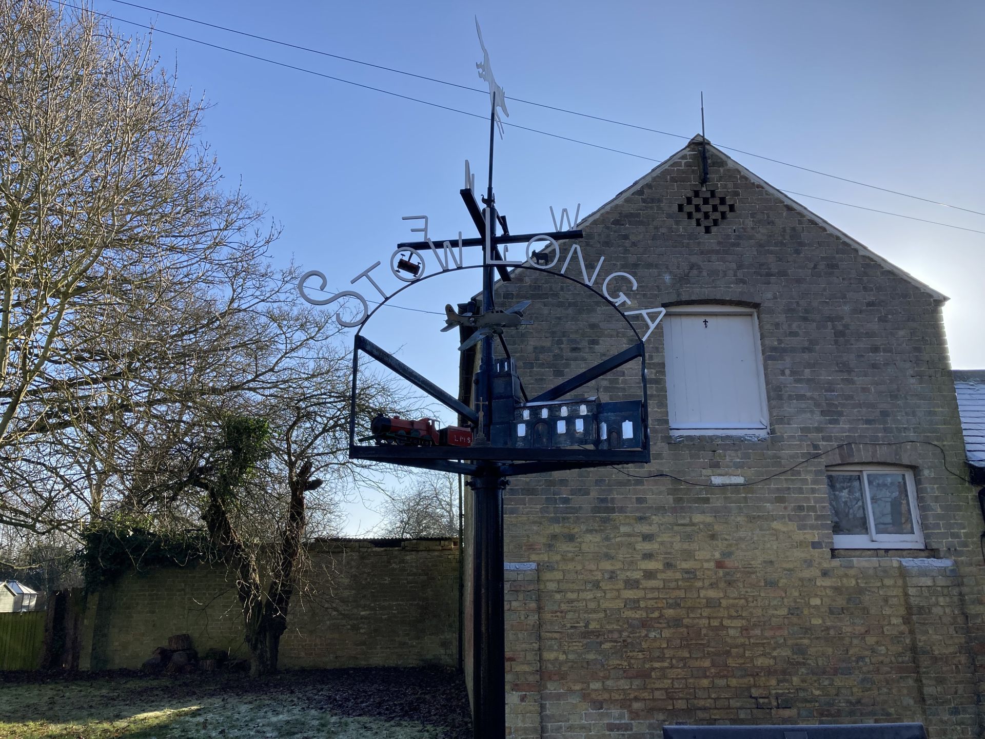 Weather vane in the village of Stow Longa
